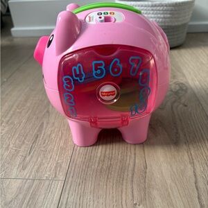 Fisher-Price Laugh & Learn Smart Stages Piggy Bank – Musical Toy w/ Coins